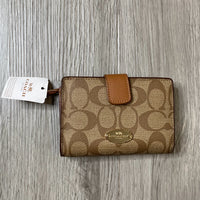 Load image into Gallery viewer, COACH BOUTIQUE
